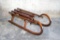 Antique hand made bent wood sleigh / snow sled with metal rails, approx 35x13x14 inches.