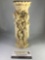 Vintage candle holder with female figure designs, approx 3x9 inches. Chip on base.