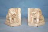 Pair of carved marble lion bookends. approx 6x6x4 inches each.