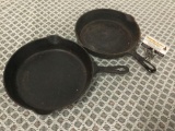 Pair of vintage Griswold small logo cast iron pans. Size 9 710 F, and size 8.