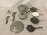 10 vintage kitchen items including: pots, pans, butcher knives and more