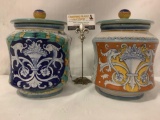 Pair of Tuscan hand painted lidded jars from Deruta, Italy, Approx. 8x8x9 inches.