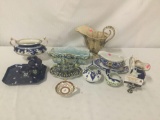 10 various pieces of china and stoneware. Some gold rimmed,hand painted. Largest approx 9x11x6 in.