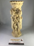 Vintage candle holder with female figure designs, approx 3x9 inches. Chip on base.