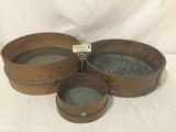 Collection of 3 vintage sieves and sifters. Largest measures approx 18.5x18.5x5 inches.