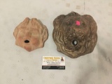 Pair of stoneware wall hanging fountain spout face style pieces. Largest approx 9x7x3.5 inches.