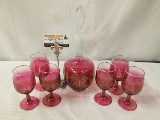 Set of pink and clear glass stemware and decanter by West Virginia glass. Branded LDS. Decanter