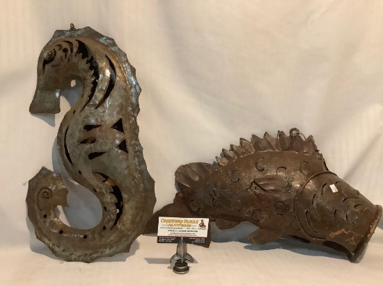 Lot of 2 metal fish/sea creature hanging home decor pieces, largest approx 18 x 10 inches.