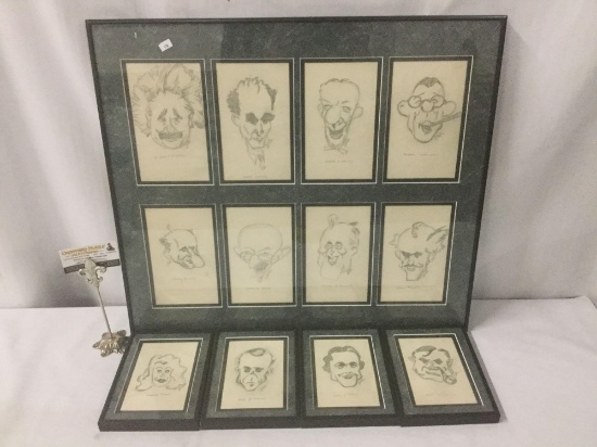 Collection of 12 celebrity caricatures signed by artist. Frame with 8 measures approx 25x22 inches.