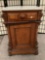 Antique wood carved nightstand with marble top, approx 20 x 16 x 31 inches. Needs repair. Sold as is