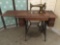 Antique wooden Singer sewing machine table w/Egyptian designs & some wear, Approx. 37x19x31 inches.