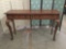 Baker Furniture sofa table with cabriole legs. Measures approx 58x35x17 inches.