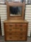 Antique turn of the century 5 drawer dresser w/carved vanity mirror & casters - great cond
