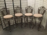 4 modern metal claw footed swiveling parlor stools, approx. 25x22x48 inches.