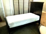 Modern single bed frame with headboard, mattress and box springs, approx 44 x 58 x 80 inches.