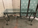 Glass top w/ metal frame long hall table, approx 18 x 50 x 27 inches.