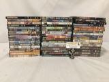 Collection of 51 Western genre film DVDs. Lonesome Dove, Magnificent Seven, and more.