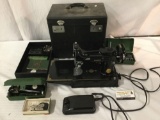 Vintage Singer 3-120 electric sewing machine. Needs maintenance, sold as is.