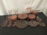 45 pieces of vintage pink depression glass. Largest plate measures approx 10x10 inches.