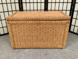 Modern wicker and wood chest/trunk. Nice condition. Approx 27 x 17 x 15 inches.