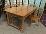 Vintage dining table w/beautiful grain & four wooden chairs.