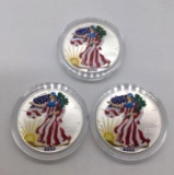 Three 2001 American Historical society colorized 1oz silver eagle bullion coins.