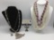 4 pieces of estate jewelry, incl. metal, bead, & rhinestone necklaces, approx. 22x2x1 inches.