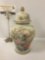 Small Japanese Shibata ceramic urn w/lid & floral designs, approx. 5x5x9 inches.