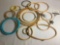 large collection of needlepoint embroidery rings / loops, largest 15 x 9 inches