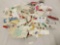 Huge lot of US postage stamps attached to envelope pieces. Christmas, and more!