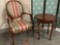 Lot of 2: cushioned armchair with striped upholstery and round wooden small table, approx 24 x 25 in