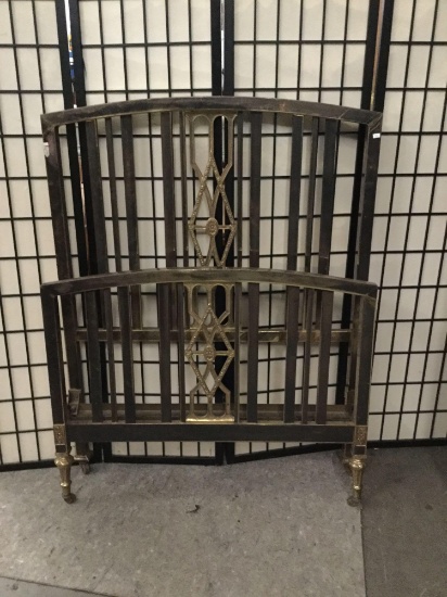 Vintage metal twin bed frame with no rails.