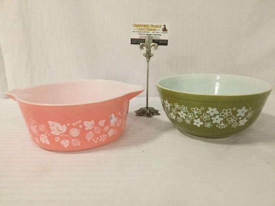 Pink & green Pyrex bowls w/floral designs, largest approx. 11x9x4 inches.