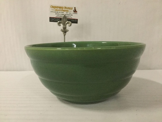 Thick U.S. made green bowl w/unintelligible bottom signature & a small chip on lip, see pics.