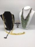 Four pieces of estate jewelry, incl. metal & bead jewelry, approx. 38x1x0.5 inches.