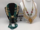 Four pieces of estate jewelry, incl. stone, metal, bead, & plastic necklaces.