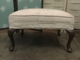 Vintage ottoman w/ white upholstery & seashell designs on legs. Shows ear, see pics.