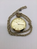 Vintage Austrian satellite pocket watch. Approx 2.5x2x0.5 inches.