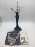 Two estate jewelry necklaces, pair of earrings, and jewelry stand.