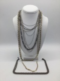 Collection of 11 vintage and modern estate jewelry chains, and one sterling chain.