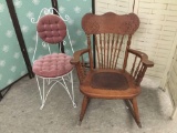 Pair of vintage chairs. Leather seat rocker and upholstered metal chair.