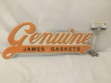 Genuine James Gaskets metal advertising sign. Approx 24x11 inches.