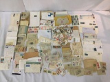 Huge collection of hundreds of US and international, postage stamps, envelopes full of stamps, more