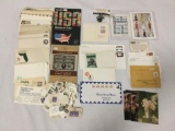 Collection of postage stamps, envelopes, postcards and more.