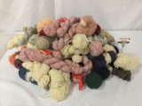 Large lot of balls, hanks, and skeins of yarn.