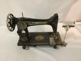 Vintage Singer sewing machine. approx 16x12x7 inches. Sold as is.