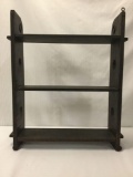 Black 3-tiered hangable shelf, approx. 26x22x6 inches.