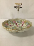 Shapely gold tone candy bowl w/floral & beach scene designs, approx. 10x10x3 inches.