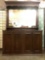 Dark wood cabinet w/ mirror, some minor wear, sold as is. Approx. 55x22x78 inches.