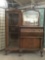 Vintage/antique 3-drawer dresser cabinet w/4 shelves, casters, & mirror approx. 68x52x21 inches.